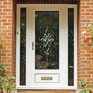 White uPVC entrance door with decorative glass