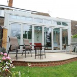 Glass front conservatory with bifold doors