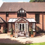 T-shaped conservatory with gable front