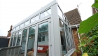 Grey uPVC reverse lean-to conservatory