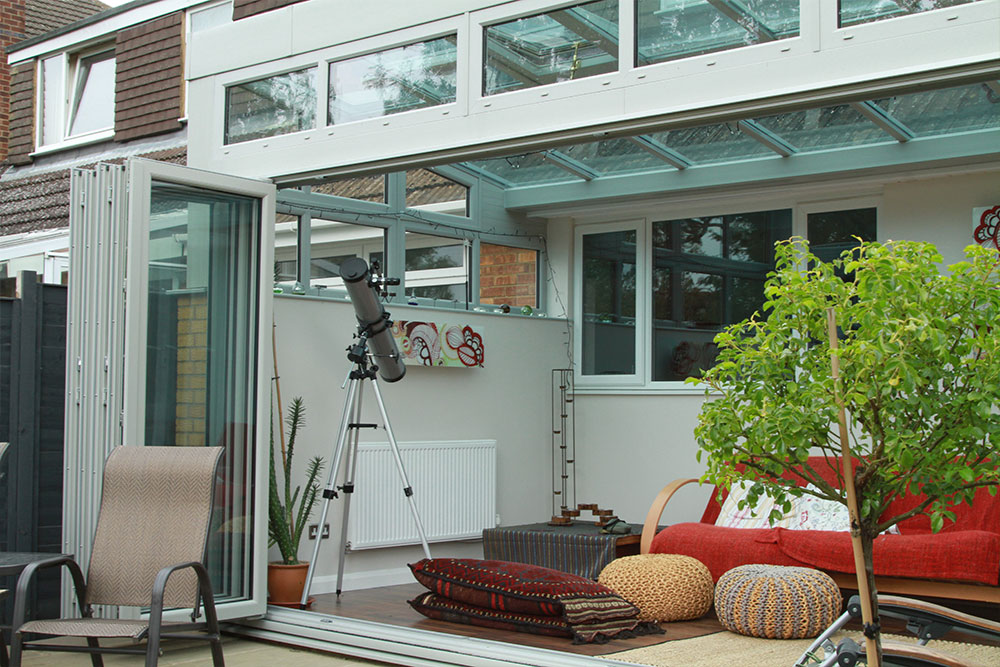 Bifolding doors on a reverse lean-to conservatory