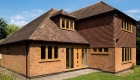 English oak coloured windows house installation